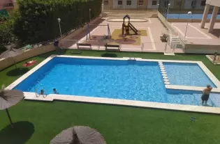 Квартира с бассейном в Аликанте