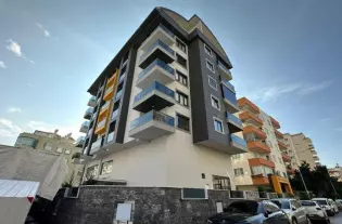 Новые апартаменты планировкой 1+1 в Алании (Махмутлар)