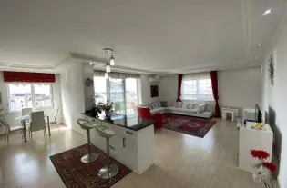 Просторные трехкомнатные апартаменты площадью 125 м2 с застекленными террасами в Джикджилли, Алания