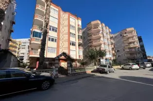 Апартаменты 2+1 с застекленными террасами и отдельной кухней в Тосмуре, Алания