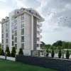 Современный пятиэтажный жилой комплекс в Турции в районе Окурджалар  (Площадь 63-180 м²)
