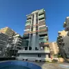 Просторные трехкомнатные апартаменты с застекленными террасами в Алании (в Махмутларе)