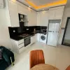 Меблированная квартира планировкой 1+1 56 м² в районе Махмутлар