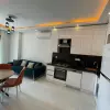 Меблированная квартира планировкой 1+1 56 м² в районе Махмутлар