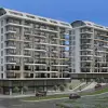 Новый проект жилого комплекса близко к центру в районе Махмутлар