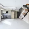 Двухкомнатная современная двухуровневая квартира на продажу в Чалыше