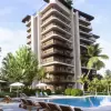 Современный жилой комплекс с разнообразными квартирами с видом на море в Искеле (003303)